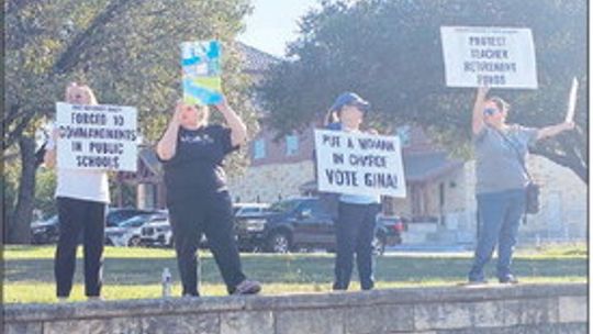 PROTESTORS CRITICIZE ABBOTT AHEAD OF ELECTION