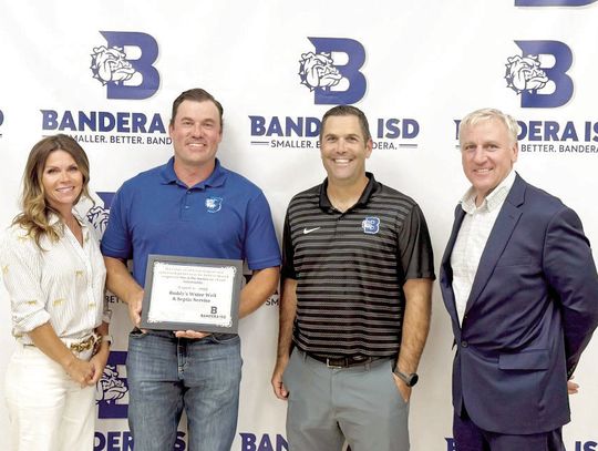 BYRD PRESENTS CHECK TO BISD