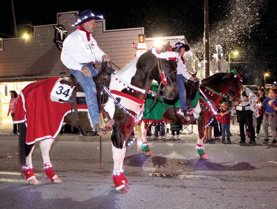 CHRISTMAS PARADE LIGHTS UP MAIN STREET