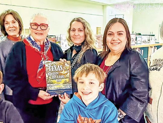 DAR donates history books to elementary schools, library