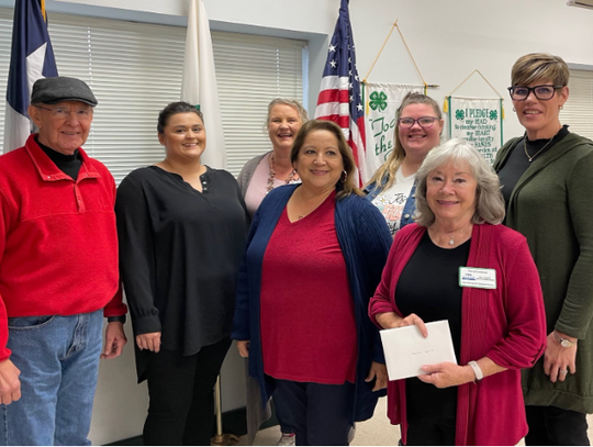 Pictured from left are Frank Dunlap, Kaitlyn Bowen, Rae Raiford, Sylvia Garcia, Jen, Sheryl Landrum and Lesley Lehrmann.