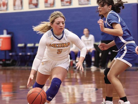 Lady Bobcats nab first district win