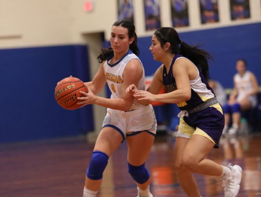 Brooke Mancha drives to the basket during the Lady Bobcats’ opening week to the season. Courtesy Photo 