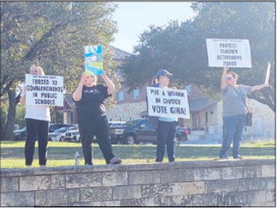 PROTESTORS CRITICIZE ABBOTT AHEAD OF ELECTION