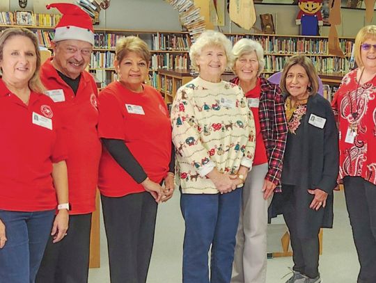 Retired Teachers donate books to area elementary students