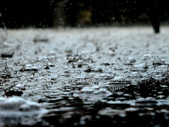 Vehicle swept away in floodwaters, search underway