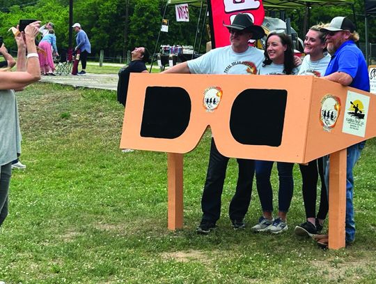 Visitors, locals enjoy historic eclipse despite cloudy skies