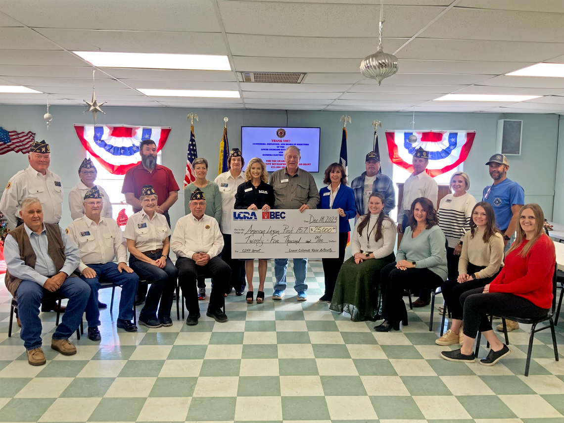 Seated from left: Richard Evans, Bandera County judge; Dennis Birchall, American Legion adjutant; Dr. Theresa Schulz and Roderick “Rod” Goff, American Legion members-at-large; Kati Fitzpatrick, BEC communications specialist; Charity Huber, BEC marketing and communications manager; Hannah C...