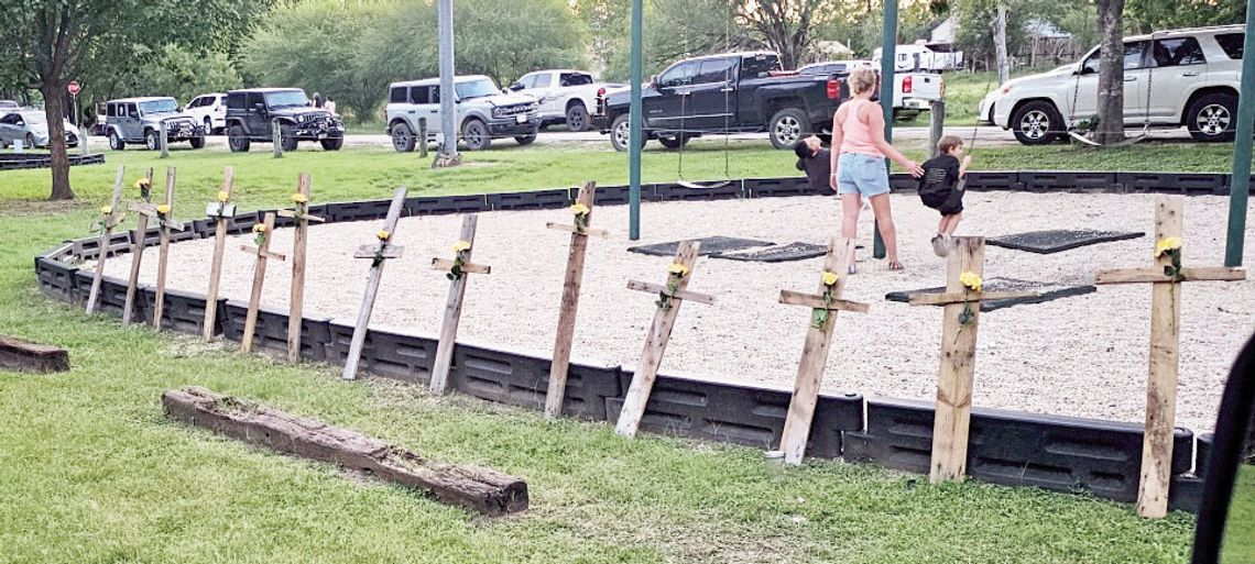 Community honors flood victims in riverside ceremony