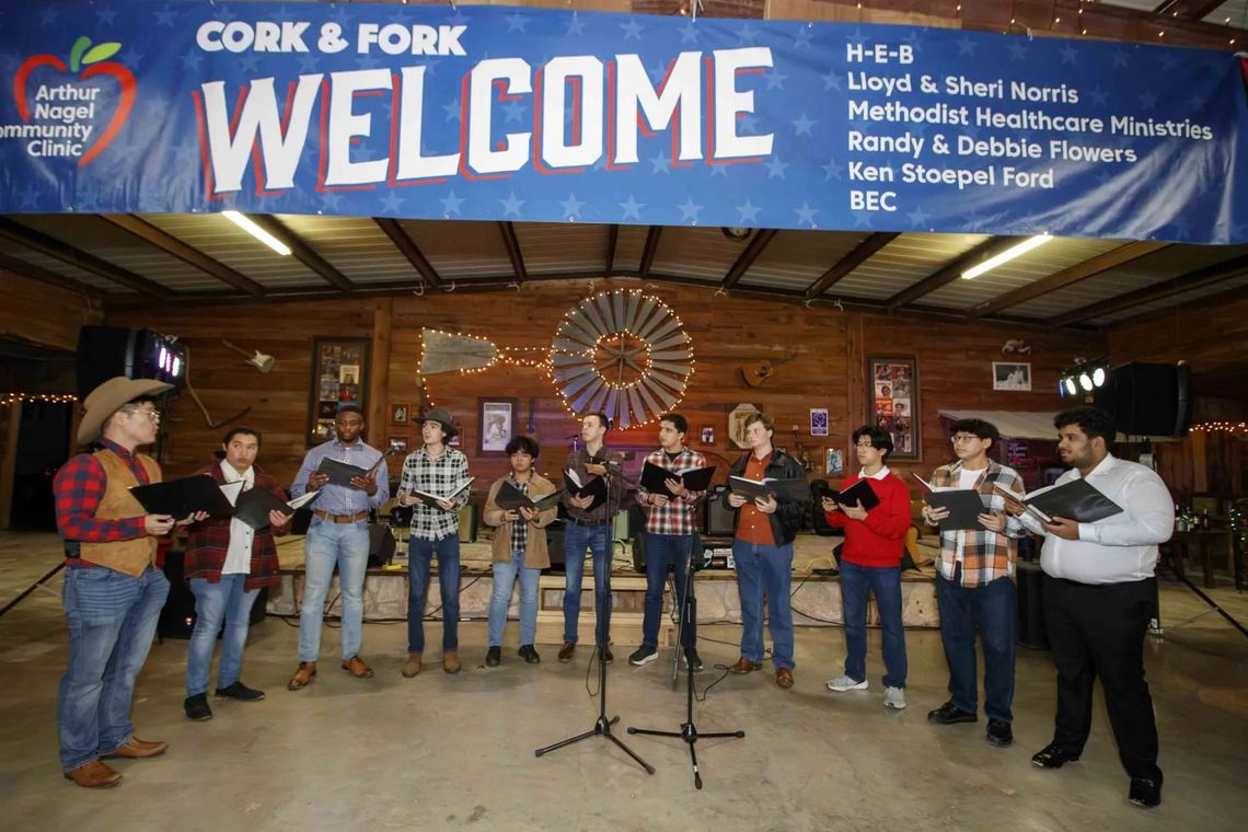 The a cappella Tenor-Bass Ensemble from UT Austin serenades the crowd at the 2023 Cork and Fork. COURTESY PHOTO 