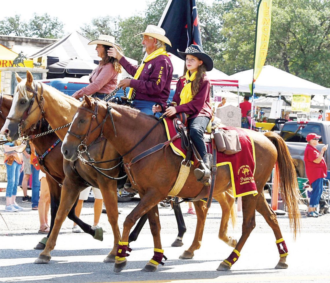 Labor Day parade includes longhorns, royalty