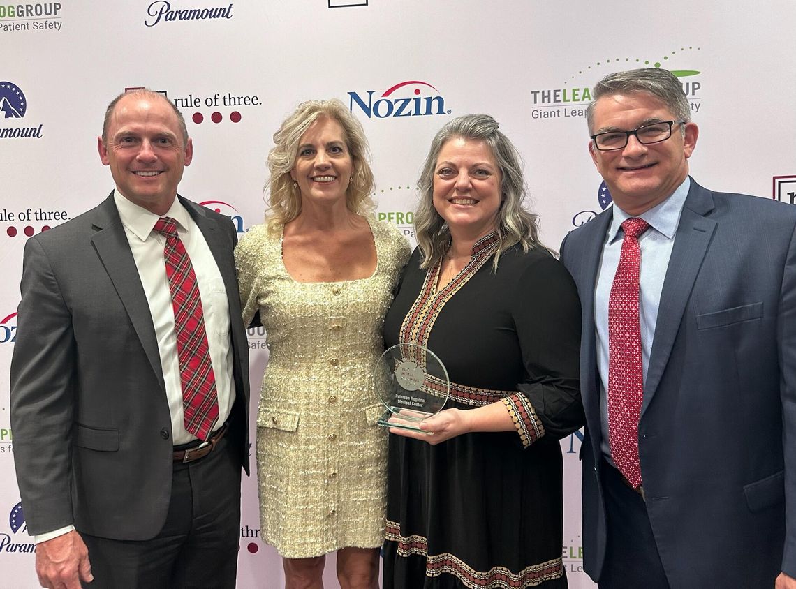 Peterson Health accepts the Top Rural Hospital award at the 2023 Leapfrog Annual Meeting and Awards Dinner in Washington, D.C. From left, Cory Edmondson, President and CEO, Sheila Donovan, Quality Nurse Auditor, Elaine Ivey, Director of Quality Services, and Dr. Christopher Glanton, Chief...