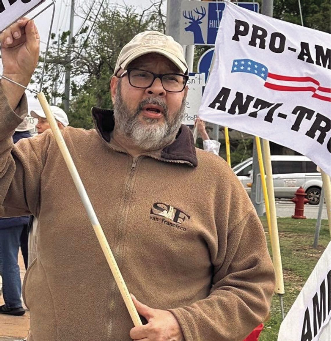 Protest organizer speaking to Dems