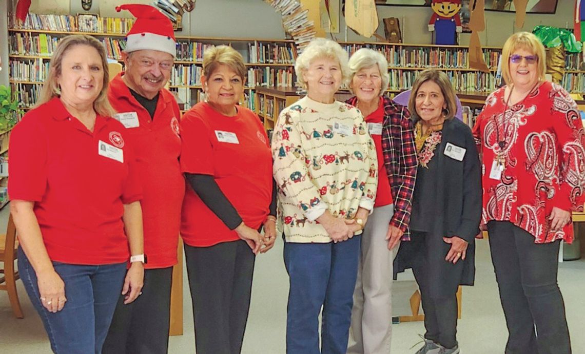 Retired Teachers donate books to area elementary students