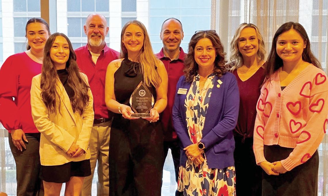 Santos recognized as staff member of the year