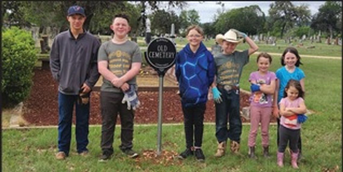 VOLUNTEERS CLEAN CEMETERY