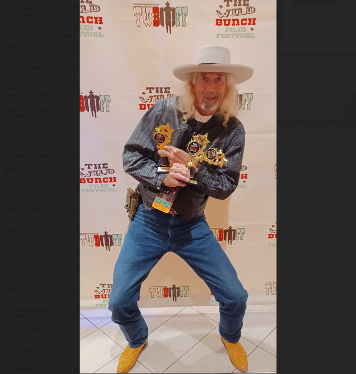 Bandera local Dennis Allyn hoists the three trophies he took home from the 2023 Wild Bunch Film Festival in Oct. 2023. Courtesy photo